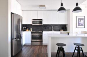 stainless steel appliances in modern apartment