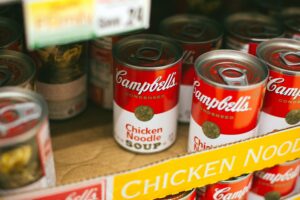 cans of soup in a box